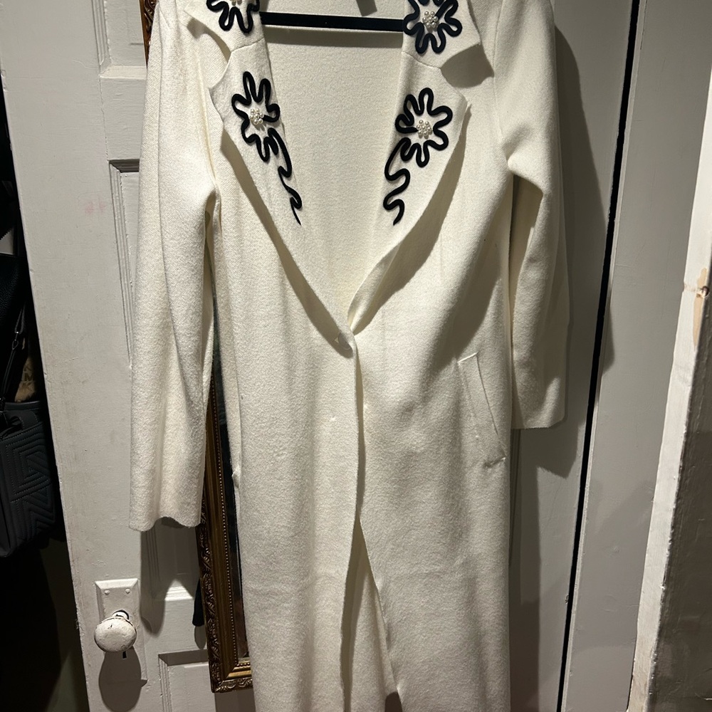 White Coat with Black Floral Accents